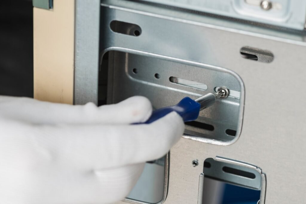 male-technician-fixing-screw-computer-slot_23-2147922374